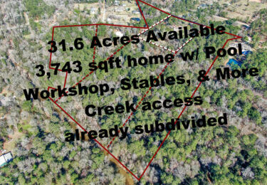 Home w/ 4.25 acres in dotted line.An aerial view of the entire 31.6 property available. Can be subdivided