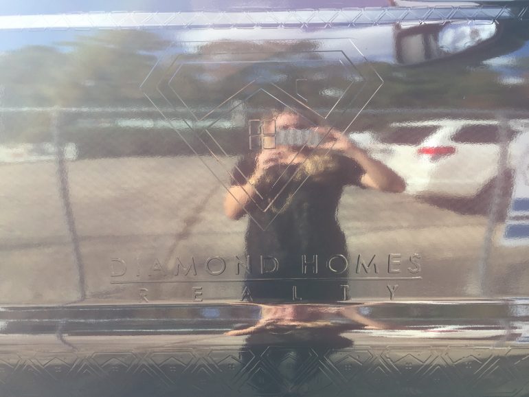 diamond-homes-realty-truck-embossed-logo